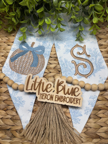 Blue toile pumpkin wreath sash with a monogram